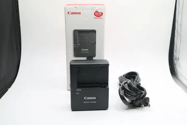 Pre-owned Canon Charger And Grip Extension Combo